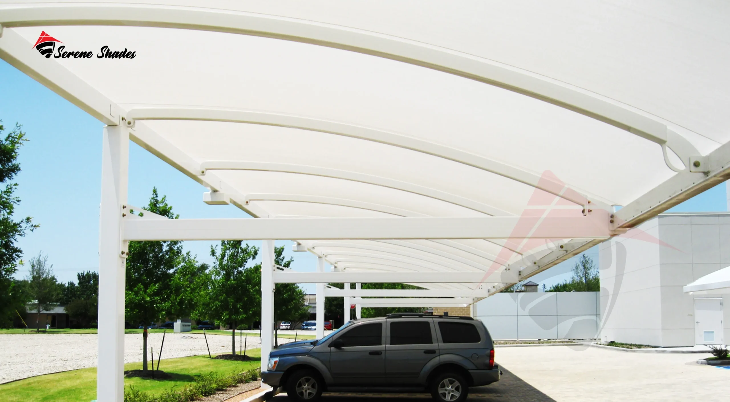 Aluminum louvered parking shade offering sun and rain protection