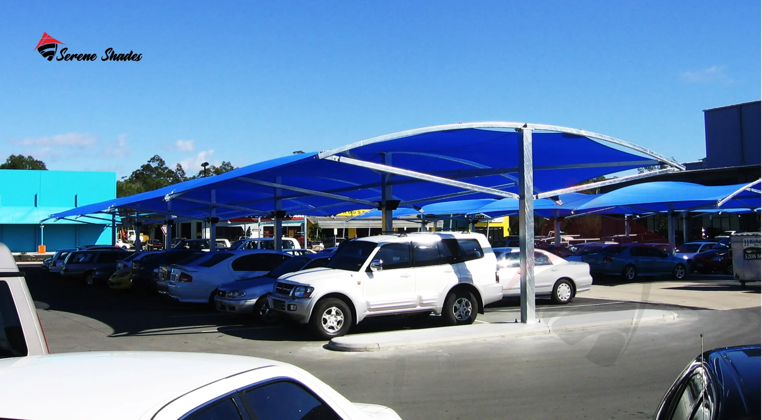 Durable parking lot shade structures for large outdoor areas