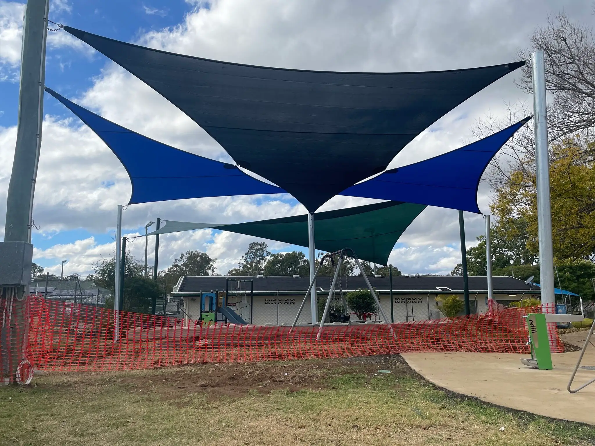 Overlapping Sail Shades offering UV protection for outdoor activities